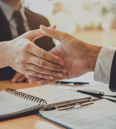 Business people greeting new colleagues while job interviewing shaking hands meeting Planning after during job interview Concept
